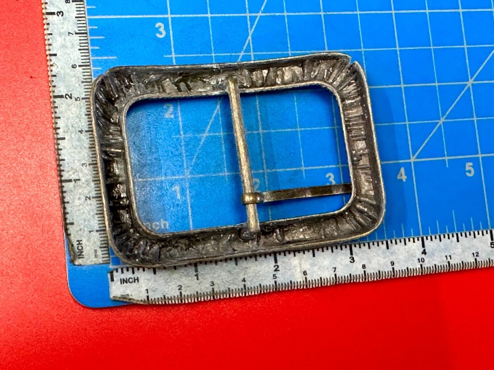 Unique Center Bar Spring abstracted wrapped style rectangular belt buckle