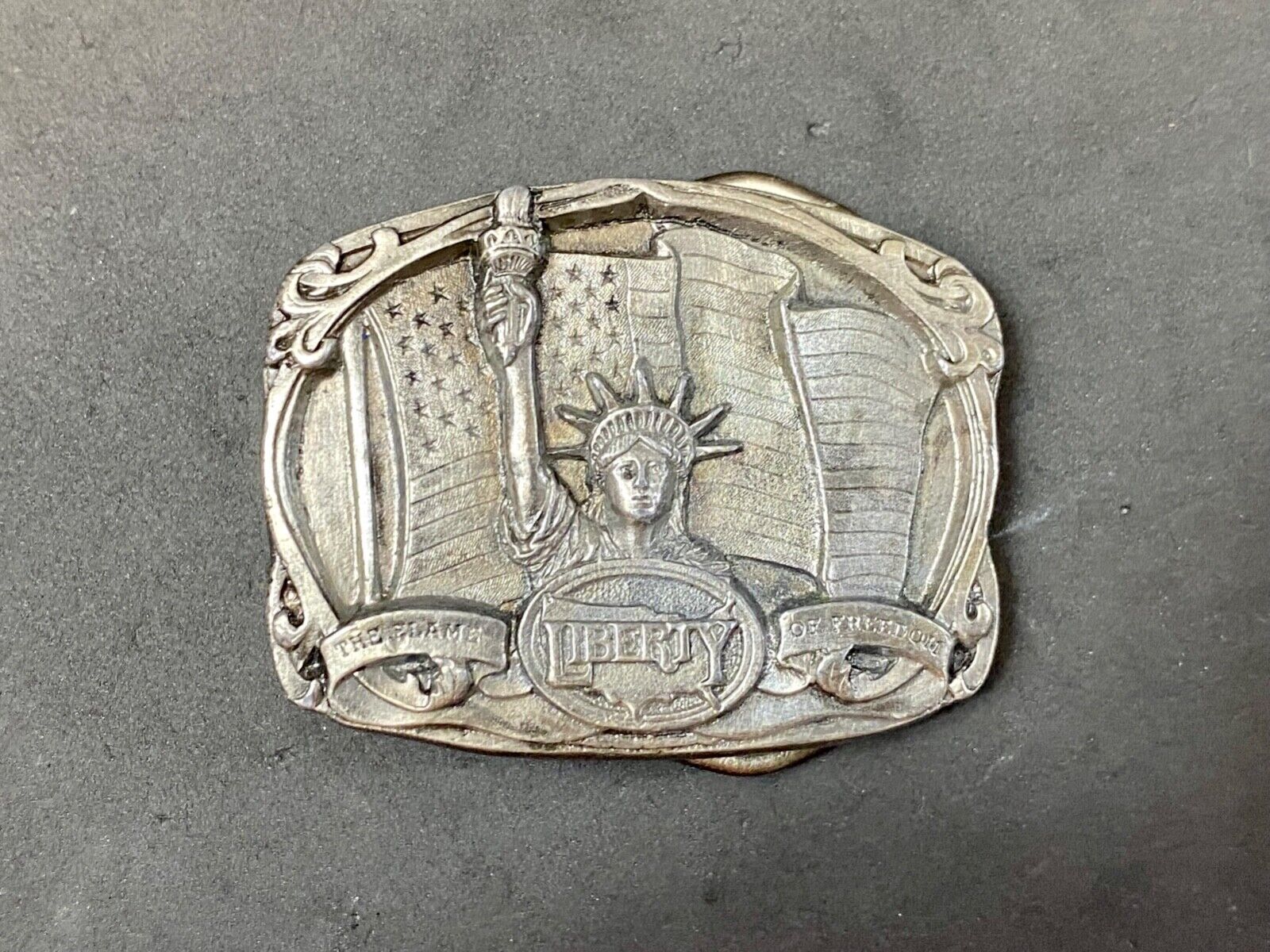 The Flame of Freedom. - Statue of Liberty 1986 Bergamot D-157 belt buckle
