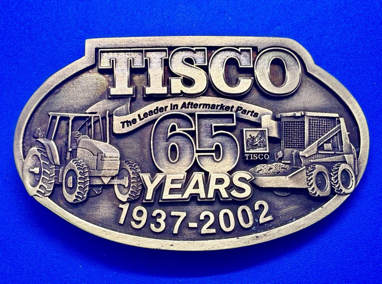 TISCO The Leader in Aftermarket Parts 65 Years 1937-2002 SPEC-CAST Belt Buckle