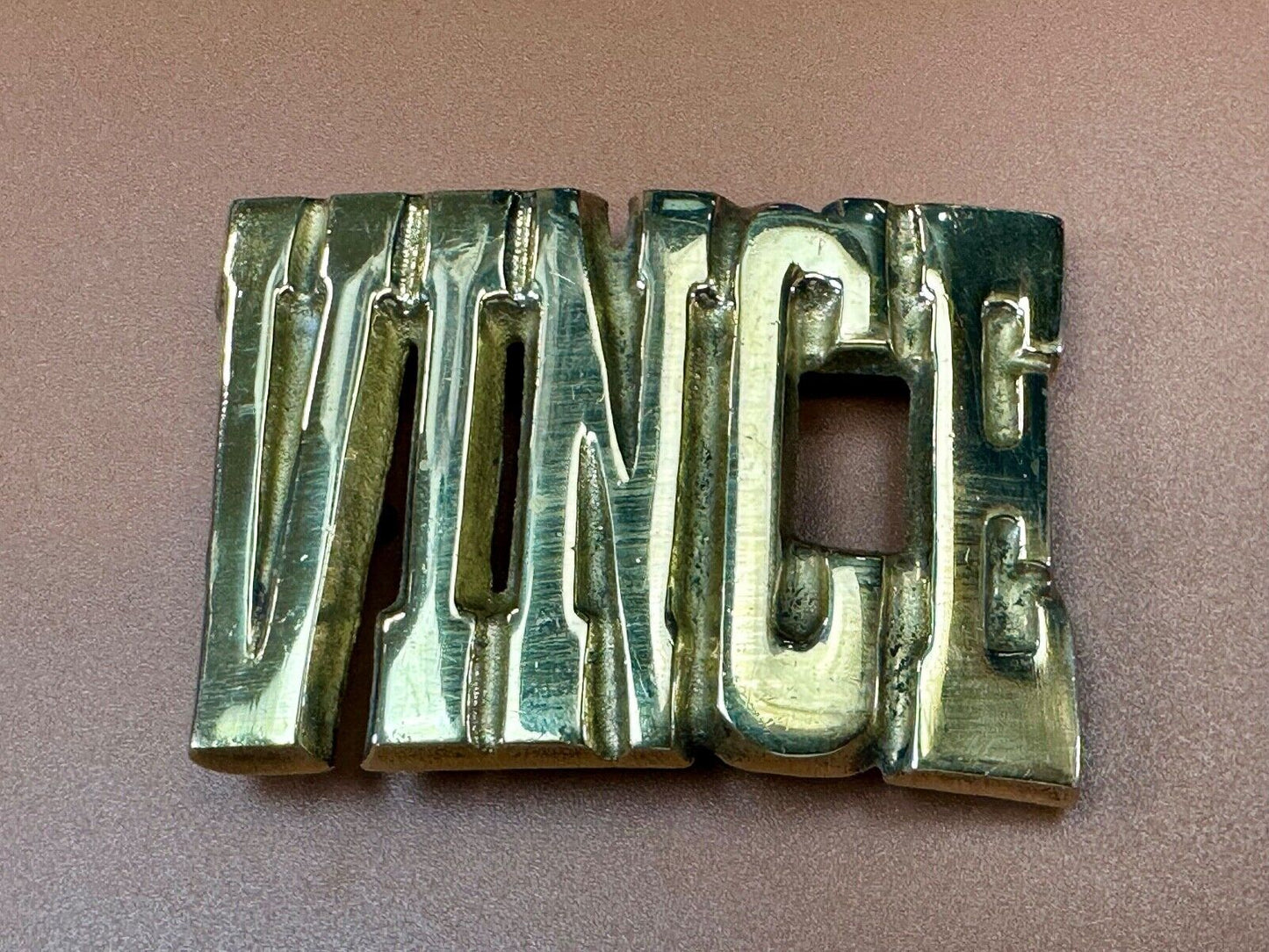 Vince,  Cutout block letters solid brass Vintage belt buckle marked Taiwan ROC