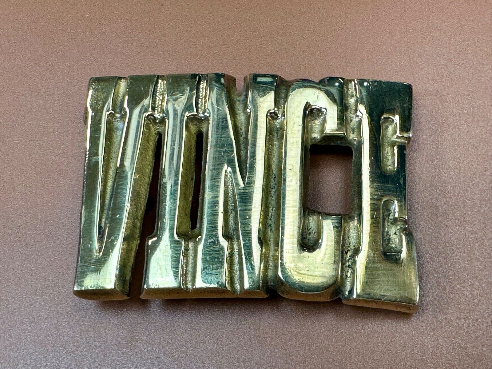 Vince,  Cutout block letters solid brass Vintage belt buckle marked Taiwan ROC