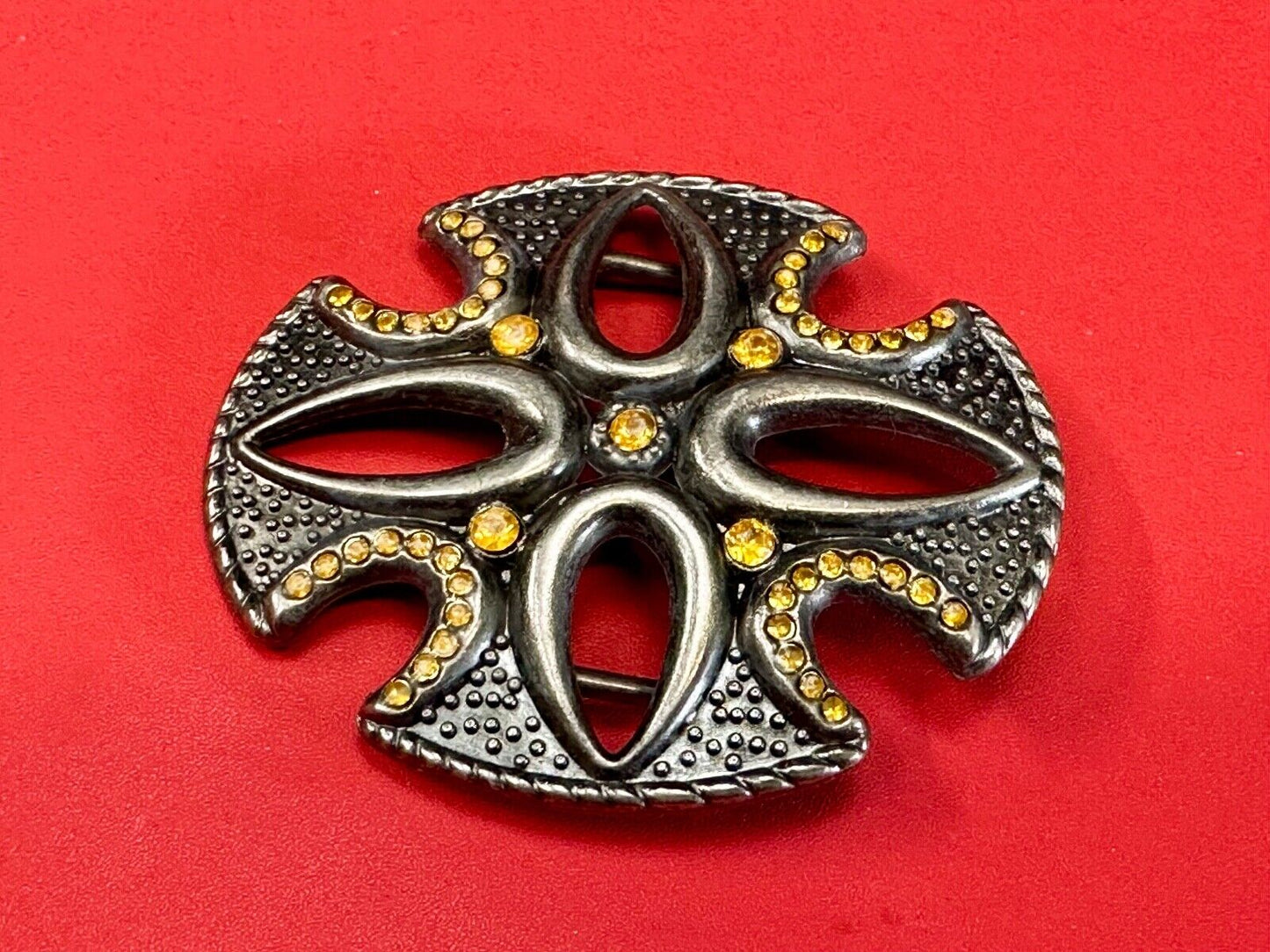 unique see through iron cross with golden brown rhinestone accents