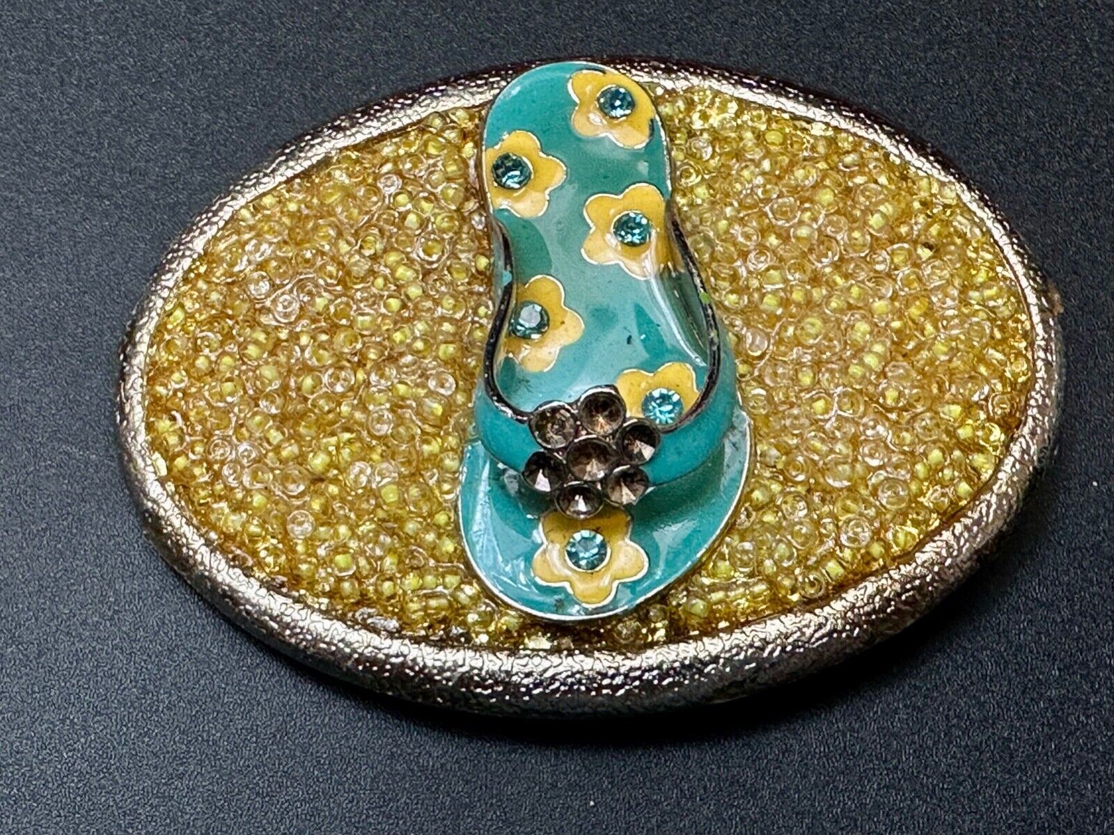 unique flip flop on sand - beach girls artisan belt buckle - missing stones?