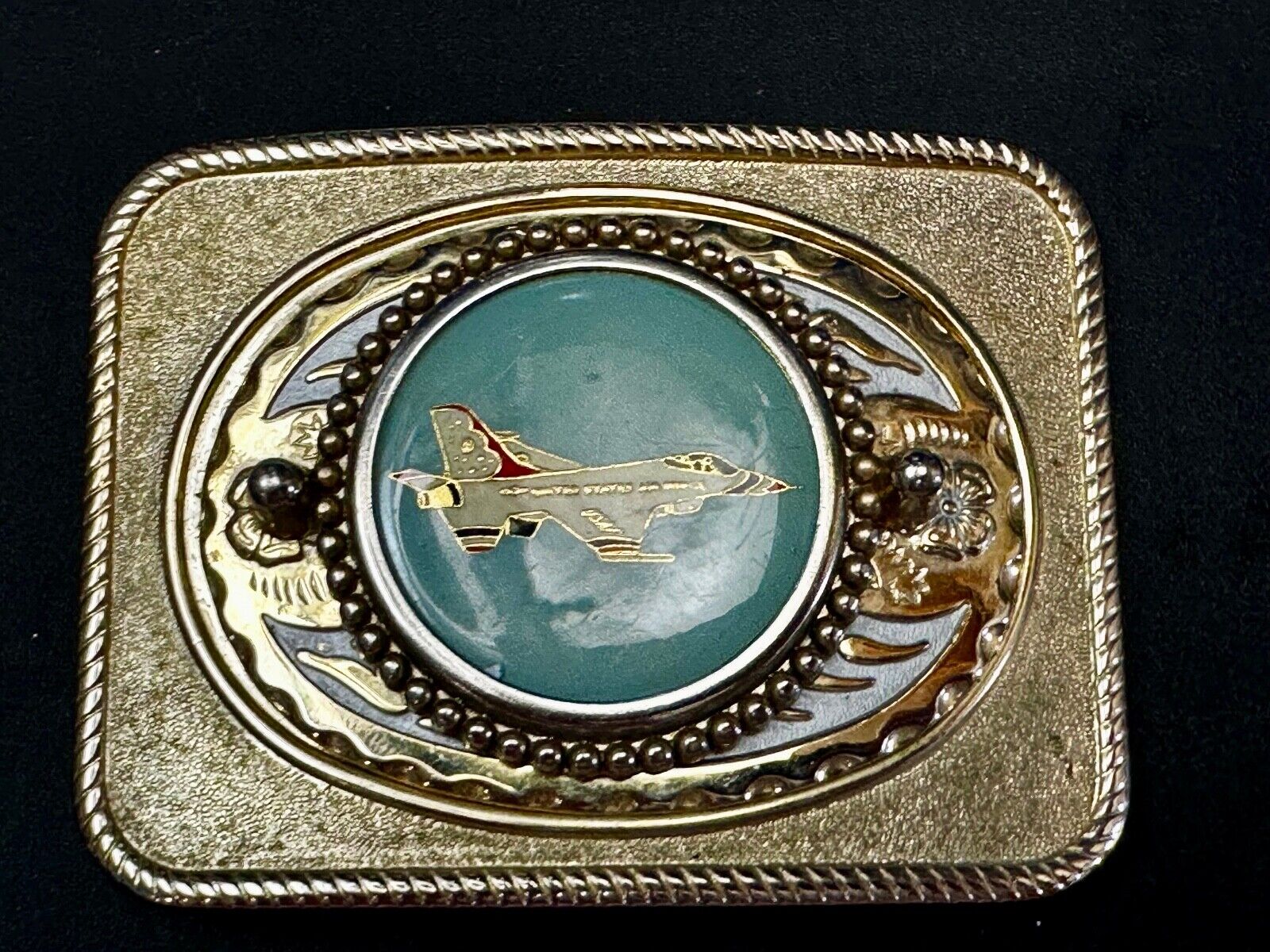 Us Air Force Fighter Jet as centerpiece in western Belt Buckle - or dollar coin