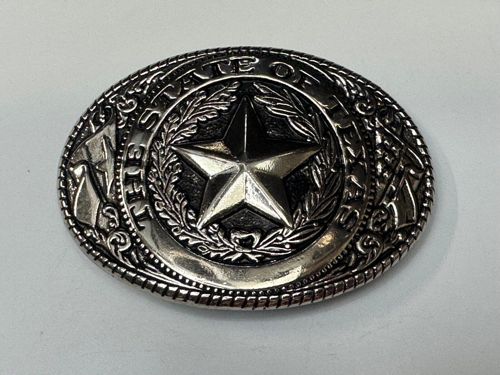 The Great State of TEXAS Star Flag Olive Branch Silver color oval Belt Buckle