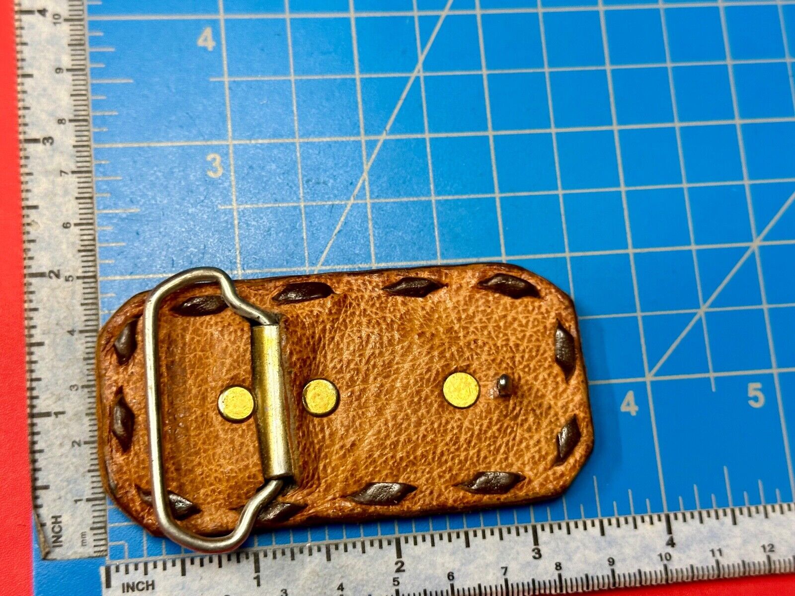 Vintage leaf pattern on stitched multi layer leather rectangular belt buckle