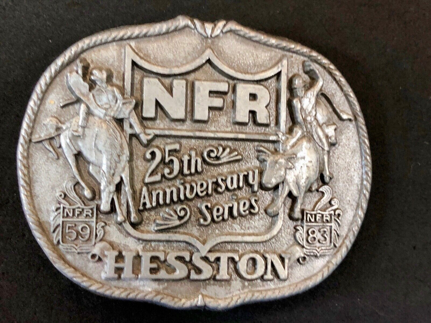 25th Anniversary 1959-1983 Hesston National Finals Rodeo belt buckle FIRST EDN.