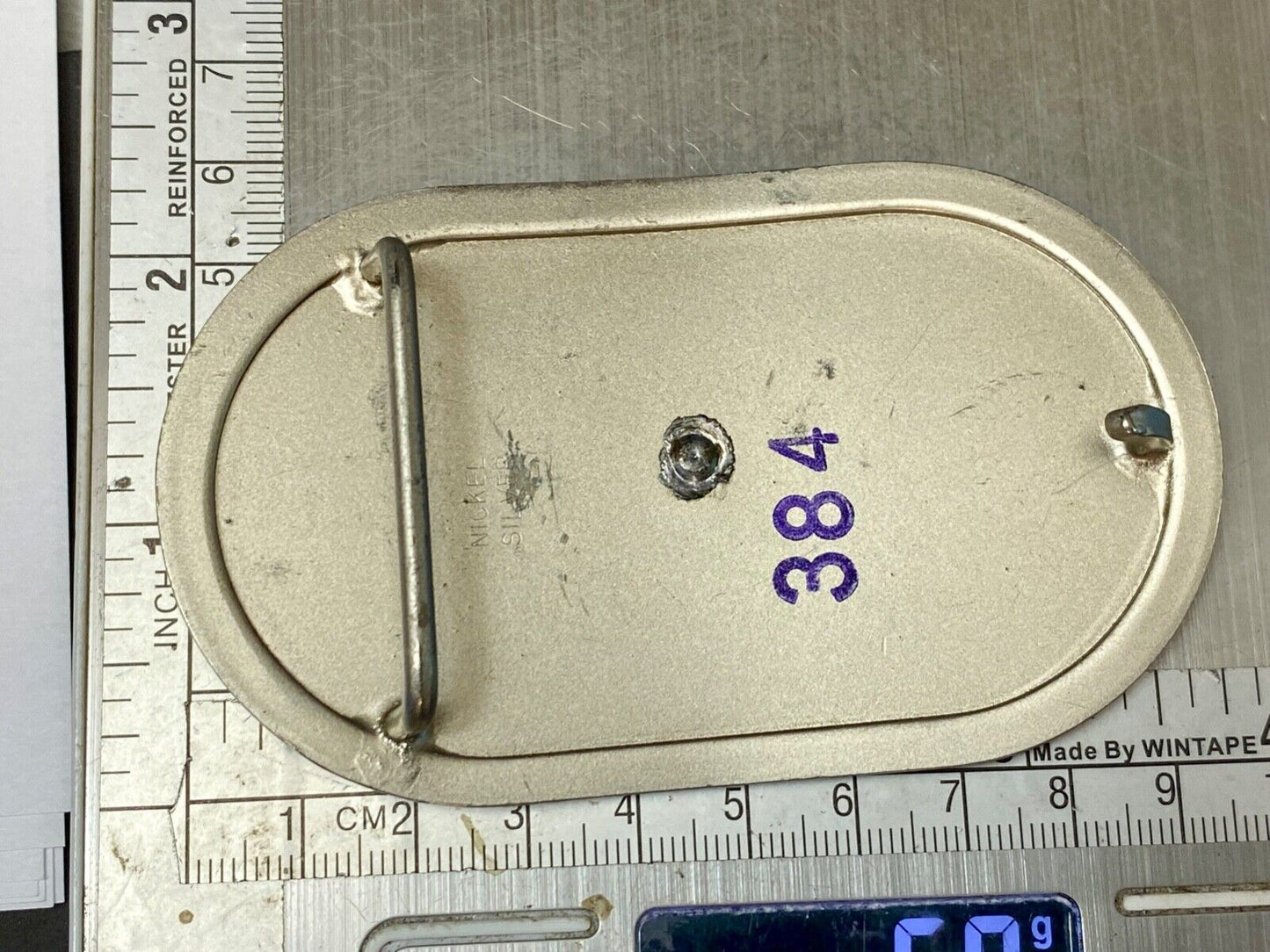 Vintage western oval Rodeo Cowboy on bucking bronc? bull numbered belt buckle