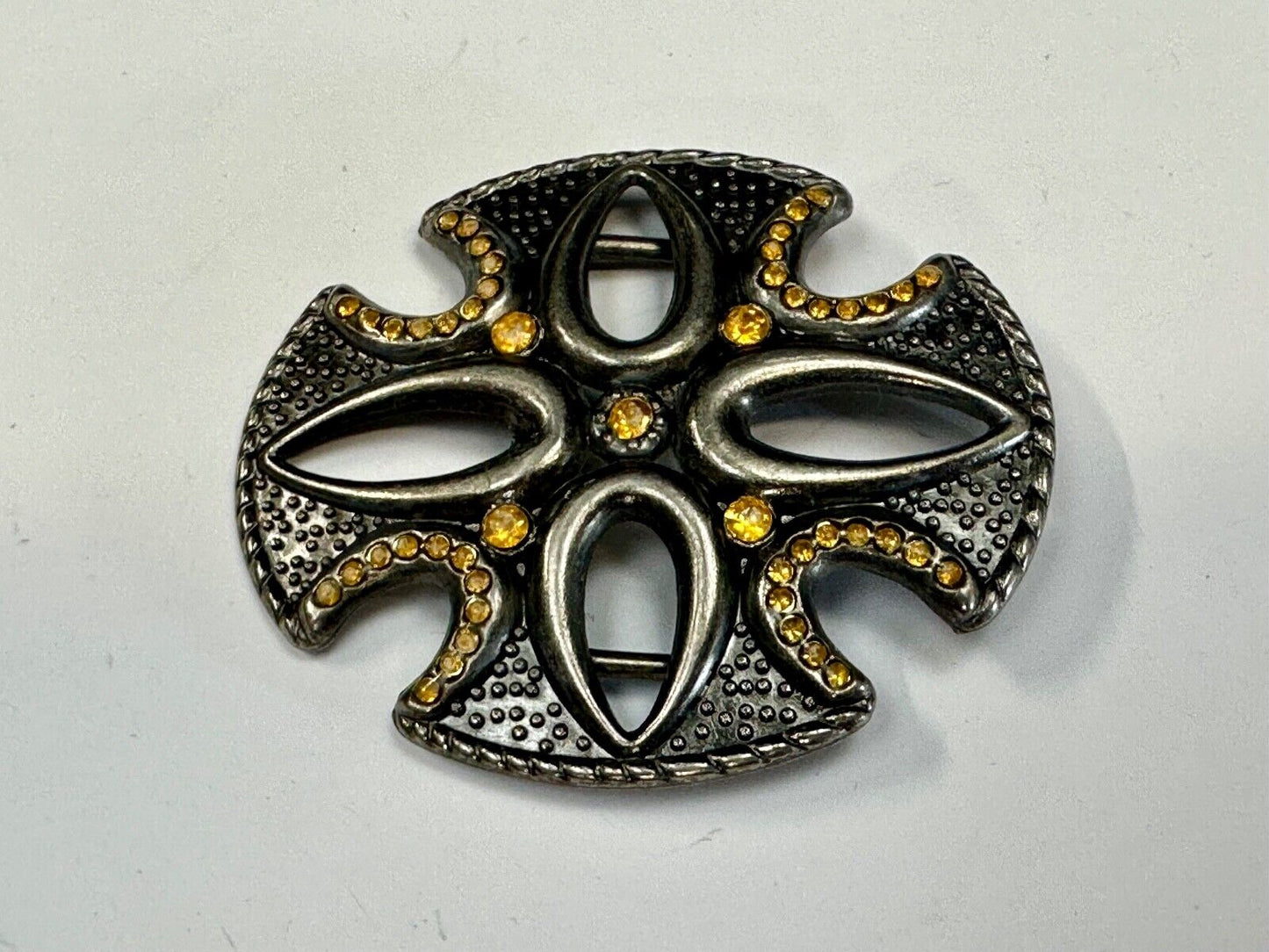 unique see through iron cross with golden brown rhinestone accents