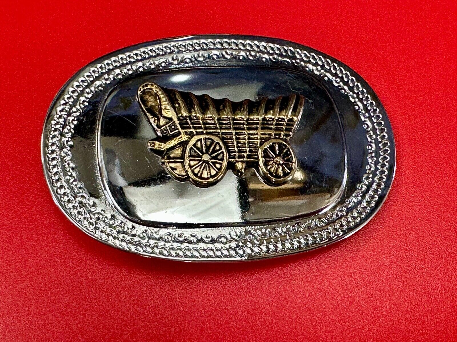 Vintage Covered Wagon - western two tone outlined belt buckle