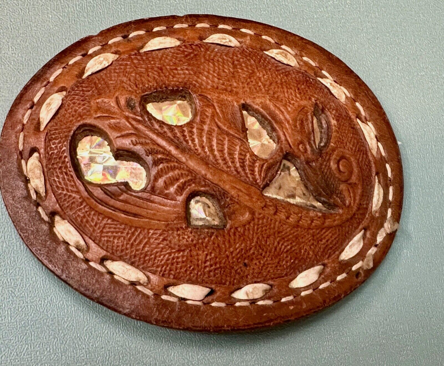 Unique leaf pattern in leather belt buckle made of Abalone shell