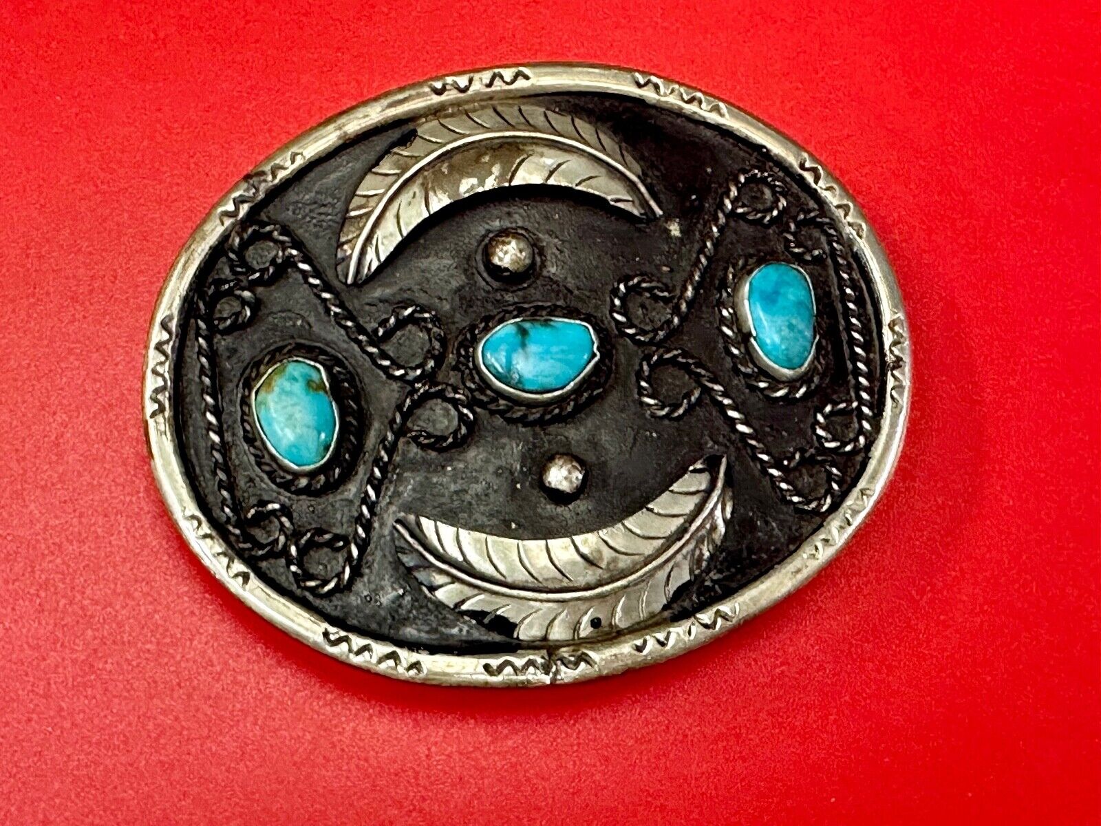 Turquoise stones raised feathers vintage belt buckle marked Sterling 0925 Mexico
