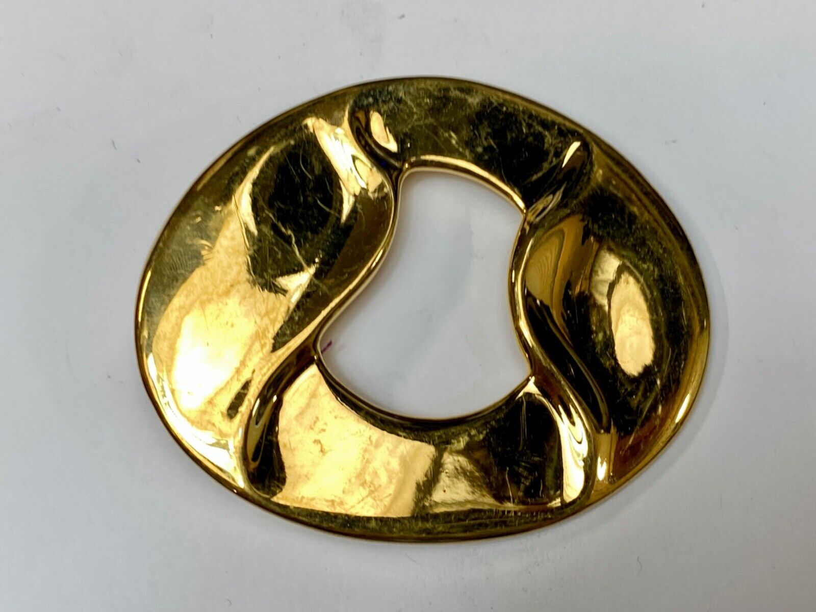 Artist Ginnie Johansen signed gold color abstract oval belt scarf slide