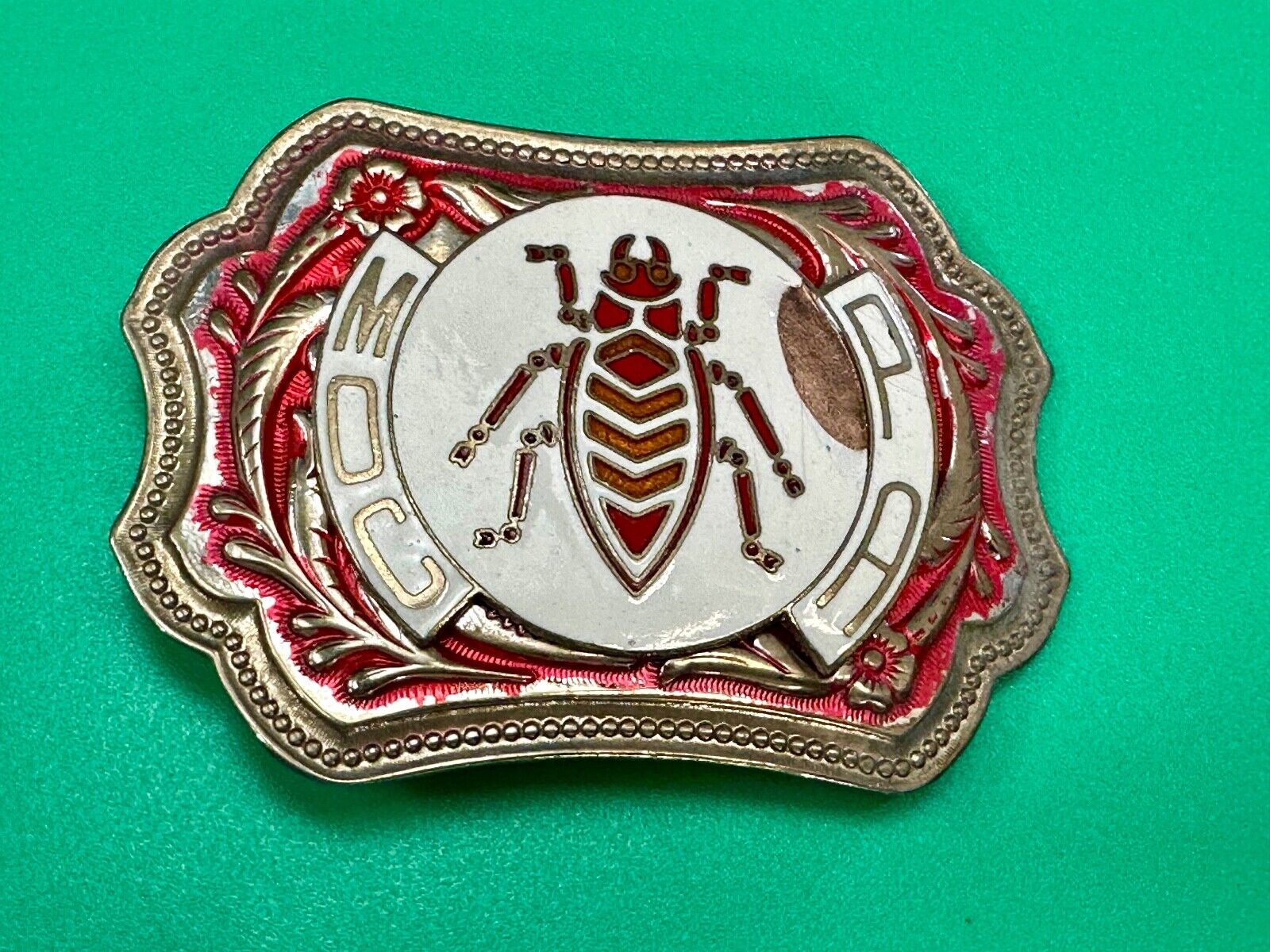unique insect bug centerpiece on western red & white flower swirl belt buckle
