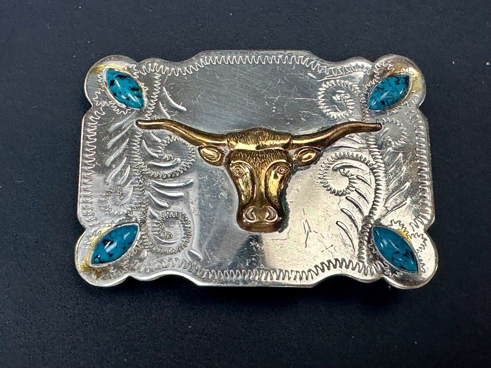 The Longhorn cow steer western nickel silver belt buckle with turquoise accents