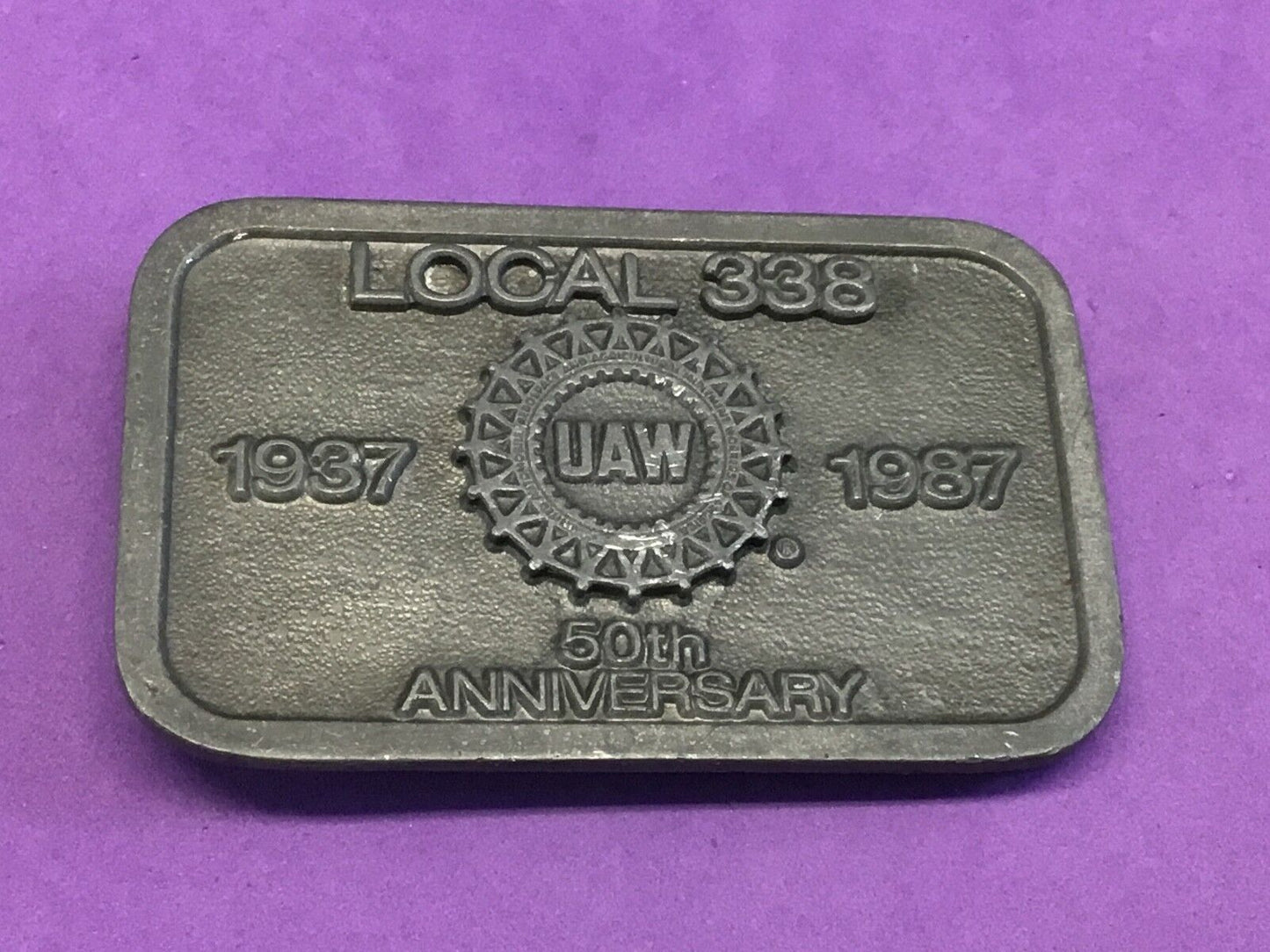 UAW Local 338 belt buckle      1987 -50th aniversery United Auto Workers  