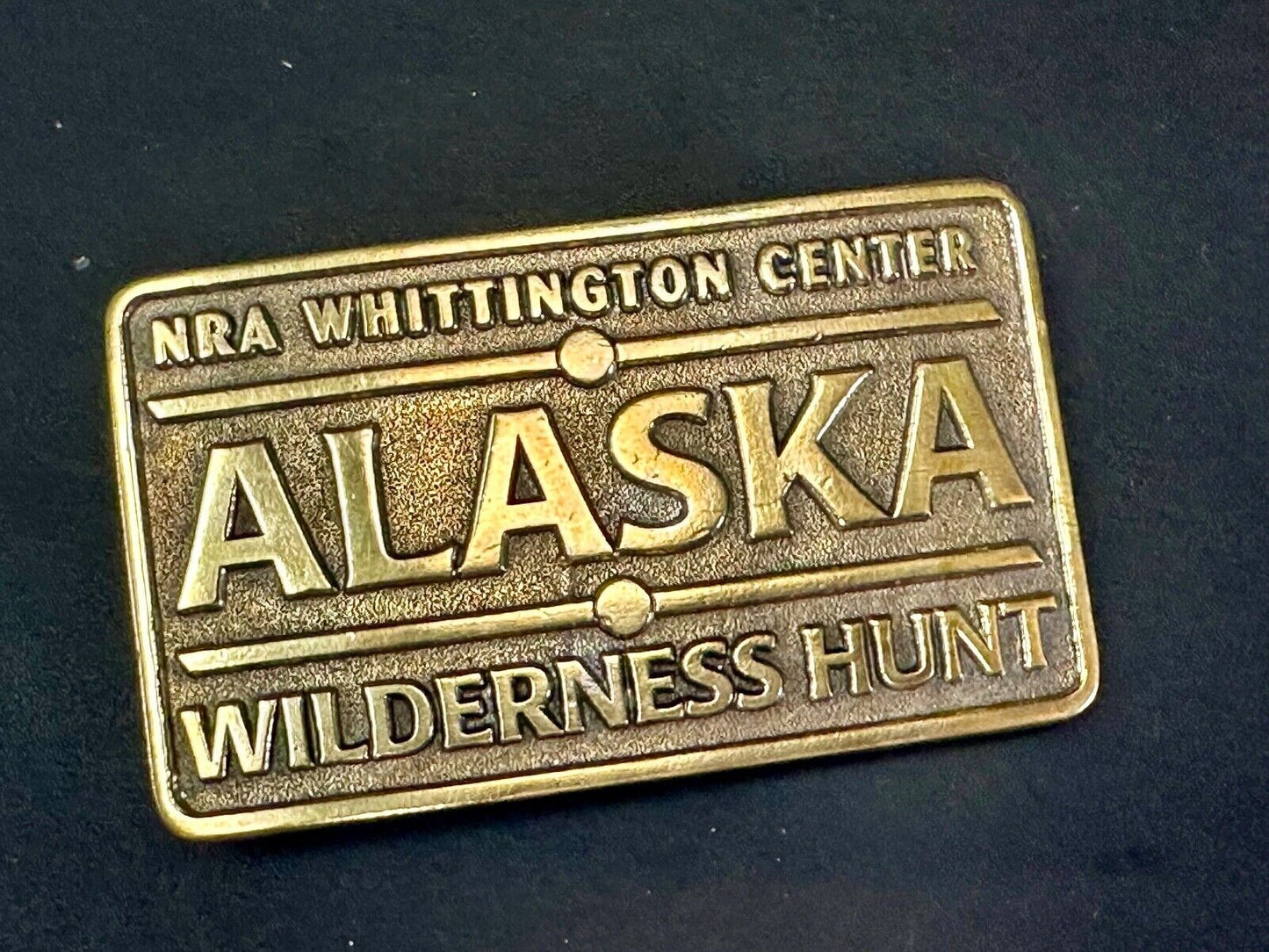 Alaska Wilderness Hunt - vintage belt buckle by NRA Whittington Center
