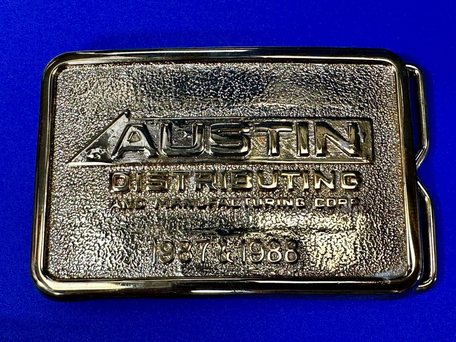 Austin Texas Distributing and Manufacturing 1987 - 1988 Gold Tone Belt Buckle