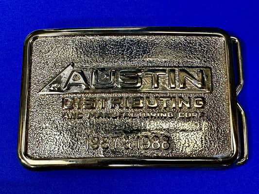 Austin Texas Distributing and Manufacturing 1987 - 1988 Gold Tone Belt Buckle