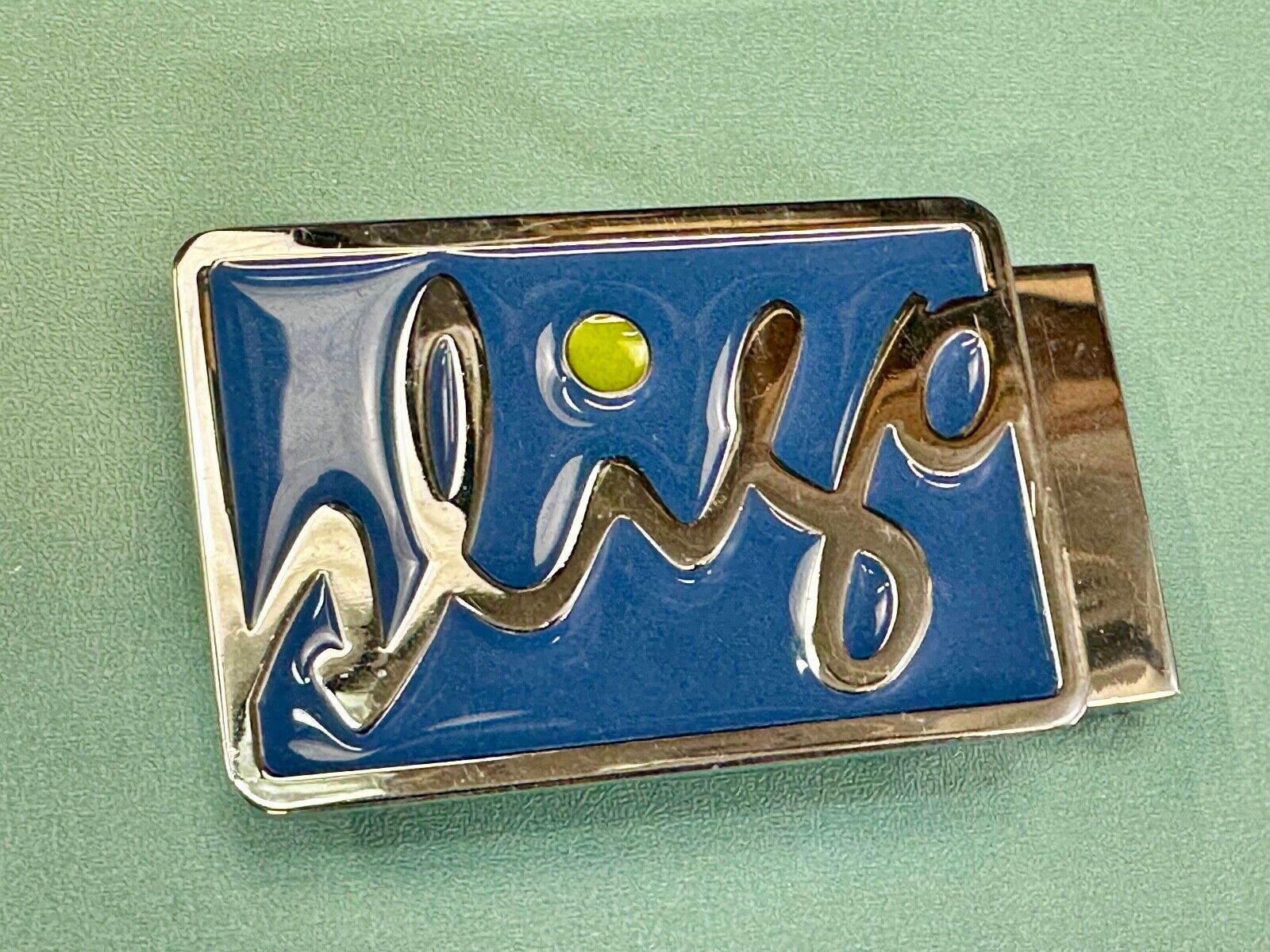 unknown to me!   Sligo Sugowear blue colored emblem or logo belt buckle