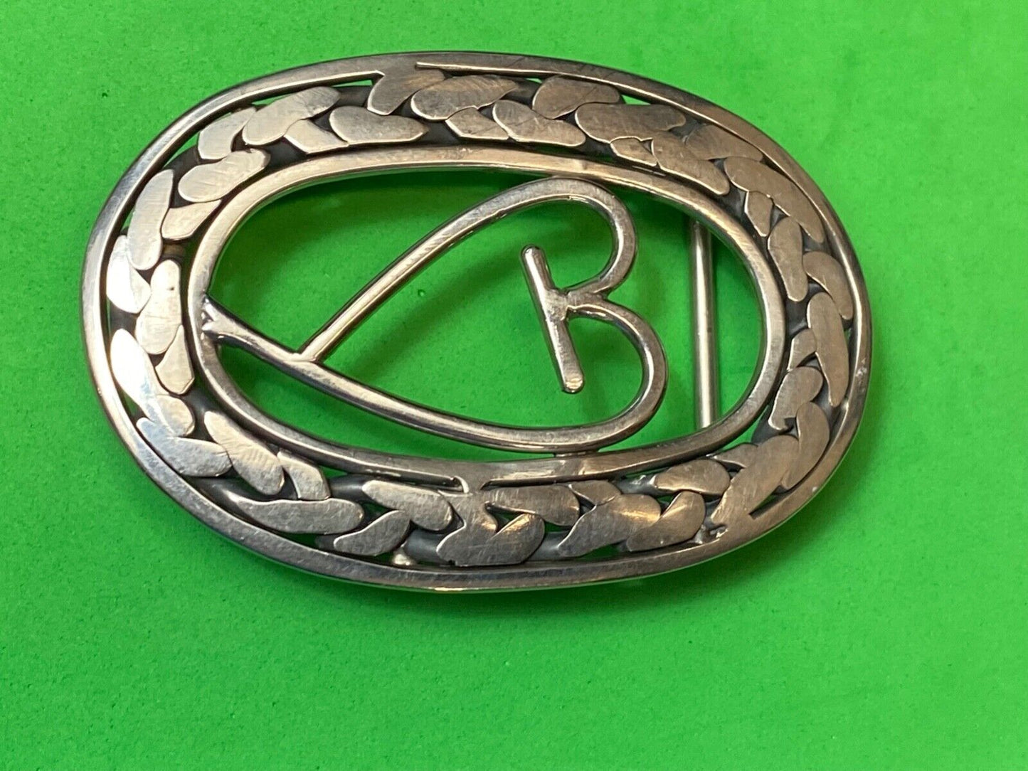 Artisan Beautiful Heart inside of open oval flower Art belt buckle