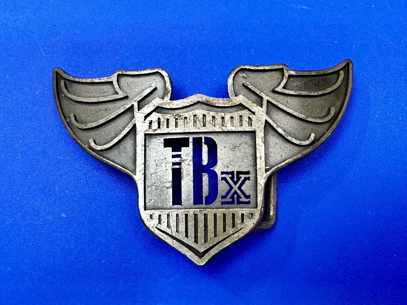 TBX Winged Bomb Vintage Silver Tone Cutout Belt Buckle