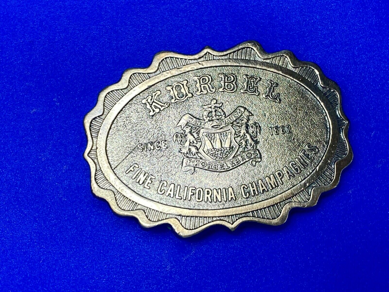 vintage Korbel Fine California champagne belt buckle by Wyoming Studio Art