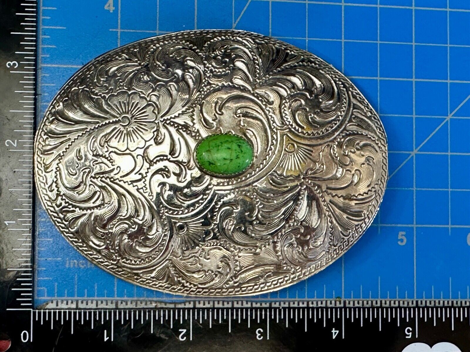 Artisan Made vtg Large western flower swirl design belt buckle  green center Cab