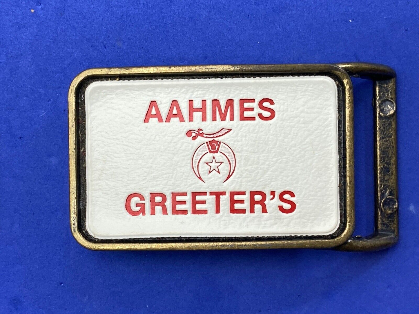 Aahmes Greeters Shriners, or Shrine Masons Club logo - white leather belt buckle