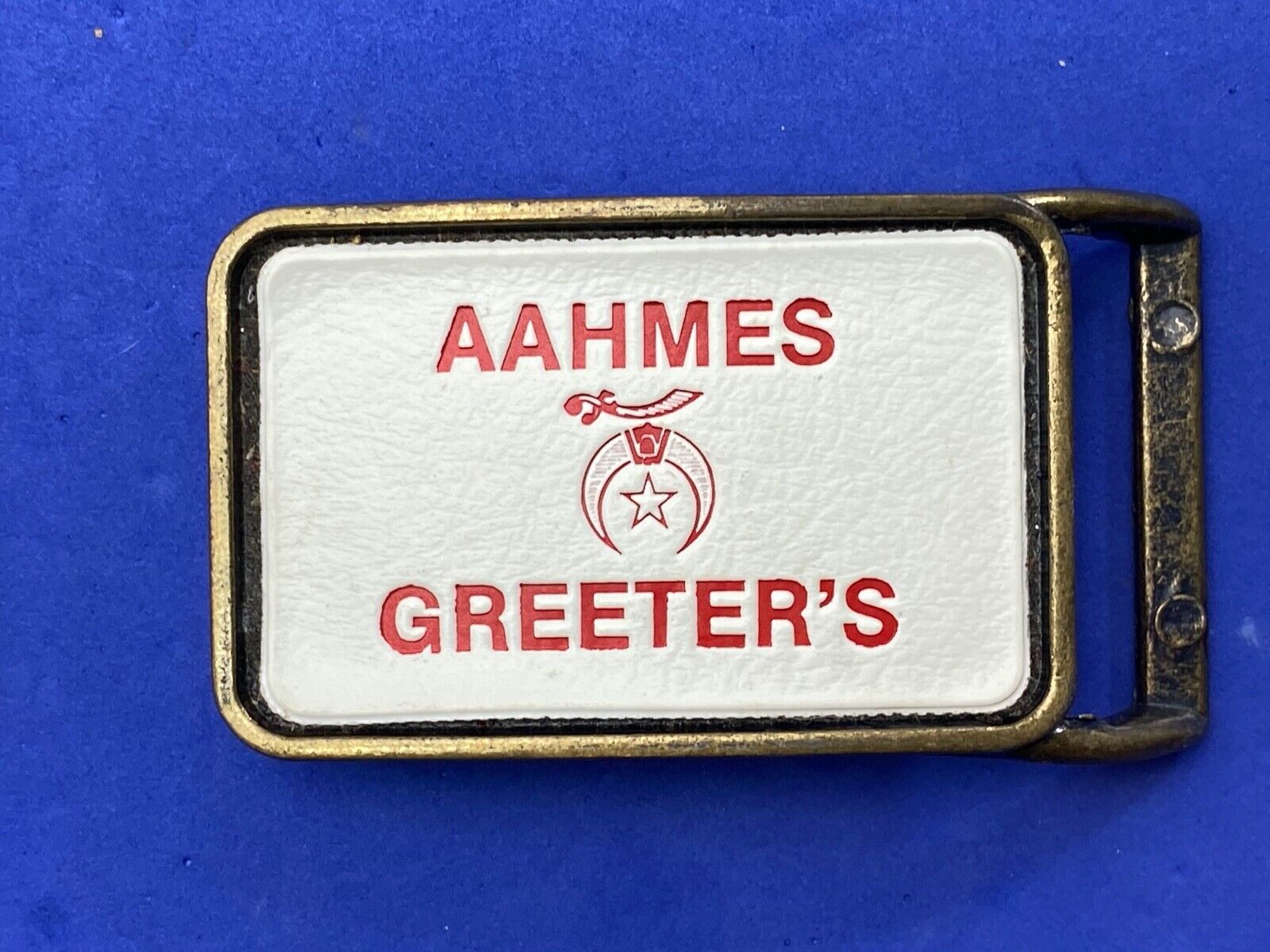 Aahmes Greeters Shriners, or Shrine Masons Club logo - white leather belt buckle