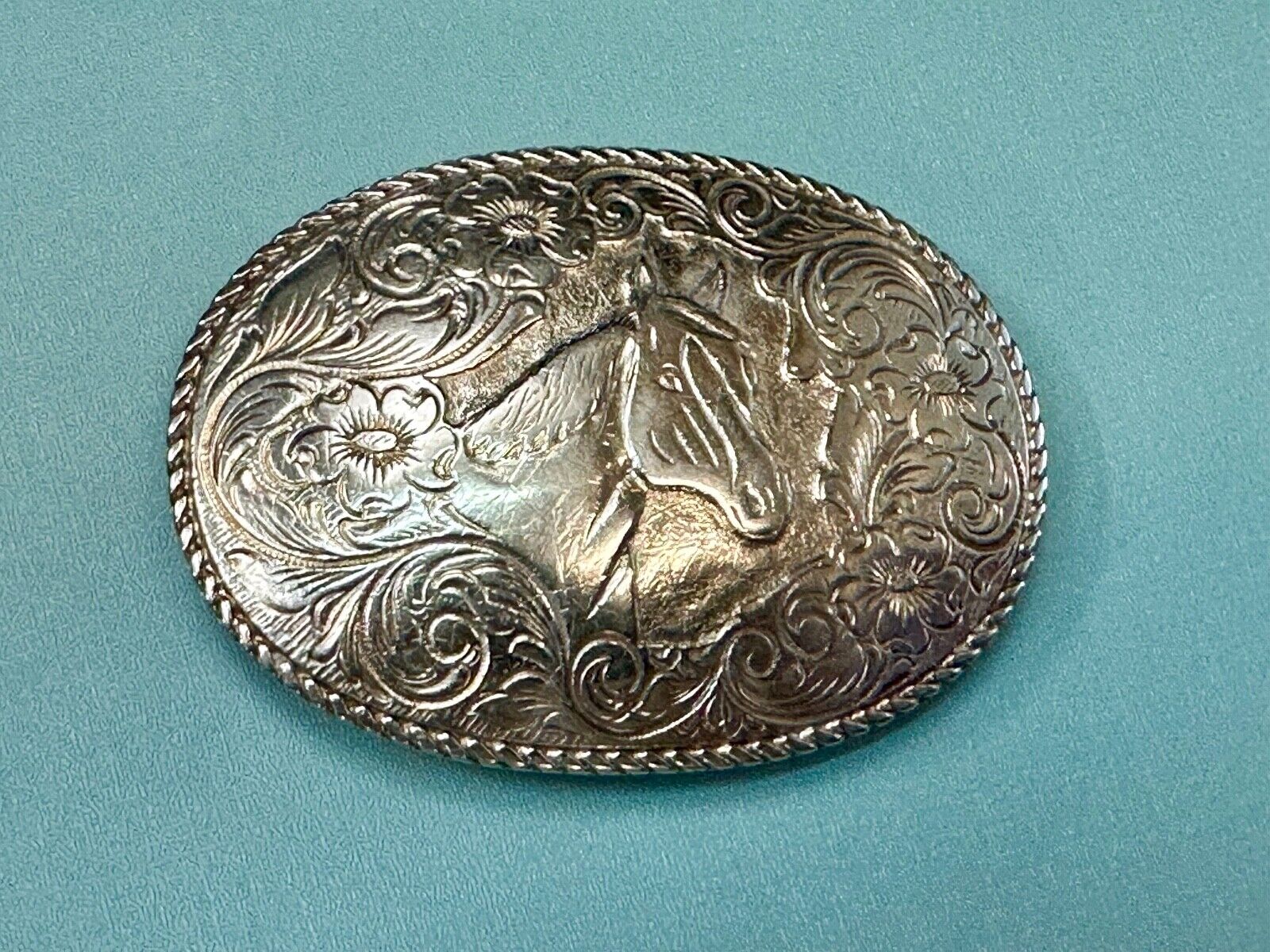 Beautiful large ornate HORSE BUST HEAD on engraved flower swirl belt buckle