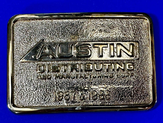 Austin Texas Distributing and Manufacturing 1987 Gold Tone Belt Buckle