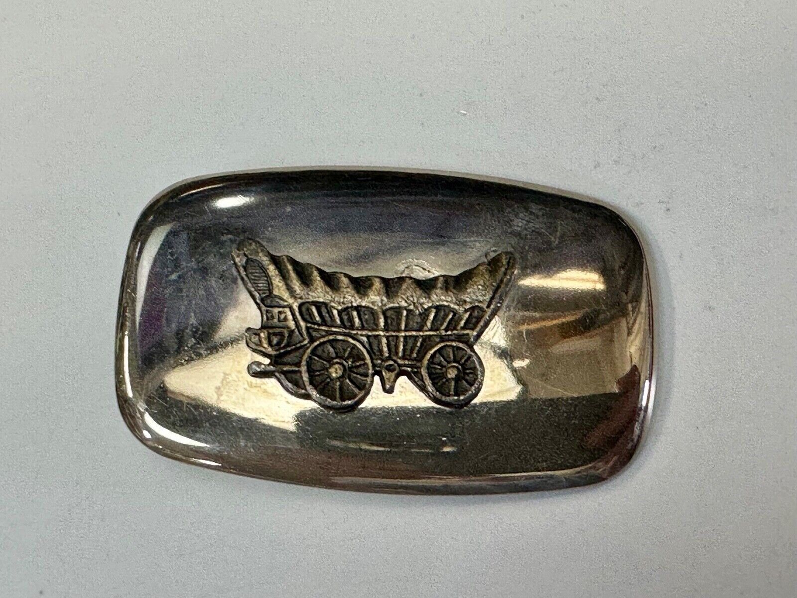 70s Covered Wagon two tone reflective rounded corner USA made belt buckle