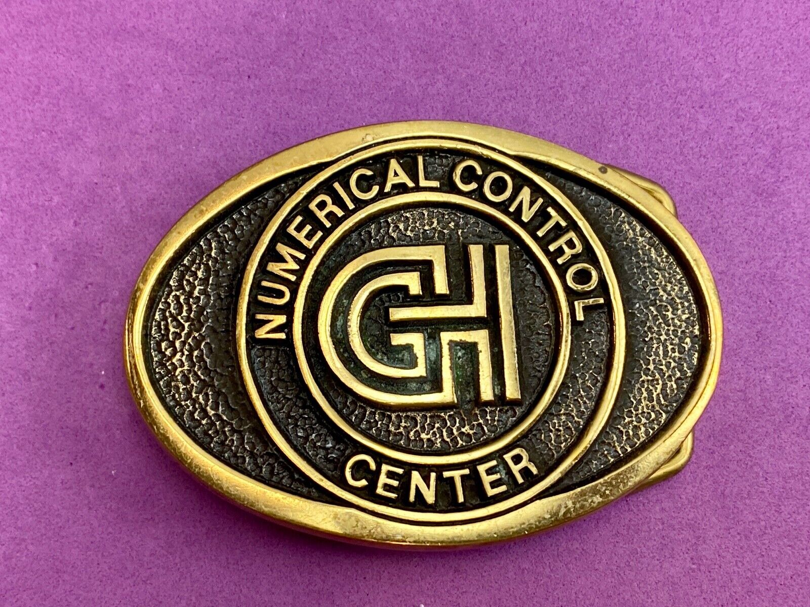 Vintage GH Numerical Control Center solid brass belt buckle by Blue Bayou 