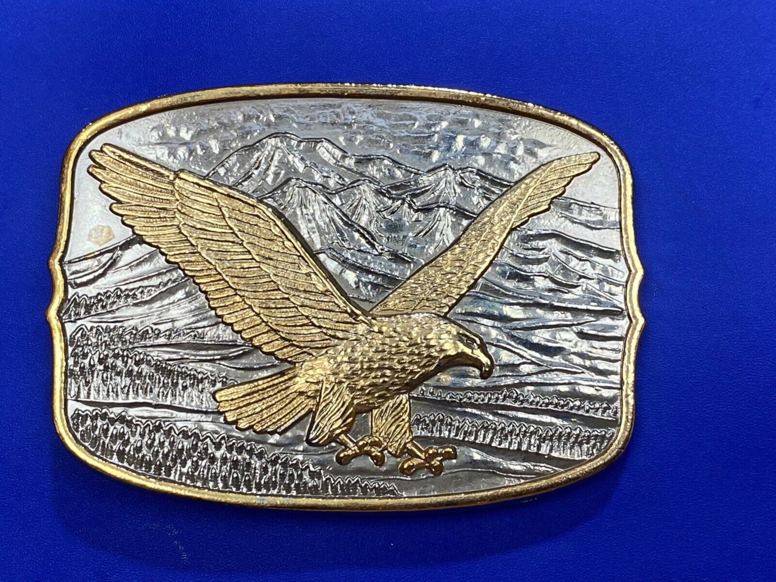 AMERICAN EAGLE Majestically hunting flying over mountains Numbered belt buckle