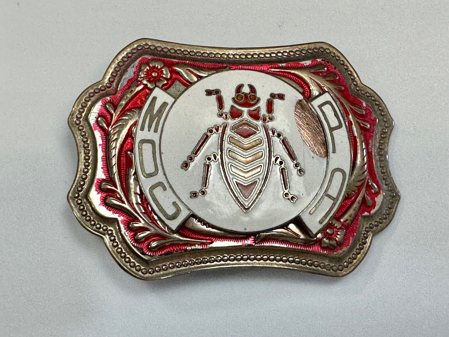 unique insect bug centerpiece on western red & white flower swirl belt buckle