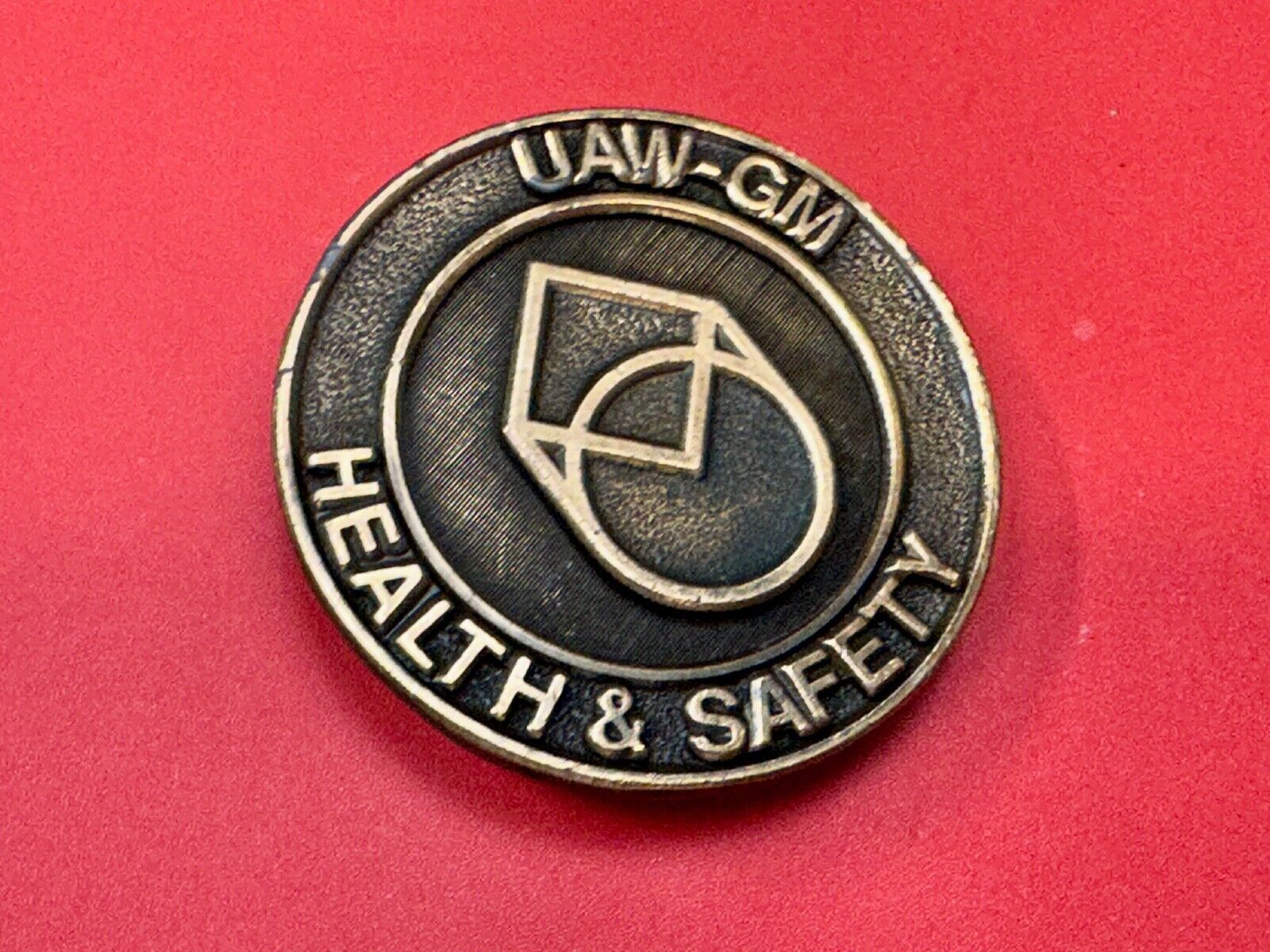 UAW-GM auto workers union round Health & Safety Award belt buckle