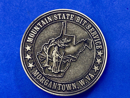Vintage  Mountain State Bit Services Morgantown W.V. round belt buckle  by Lewis