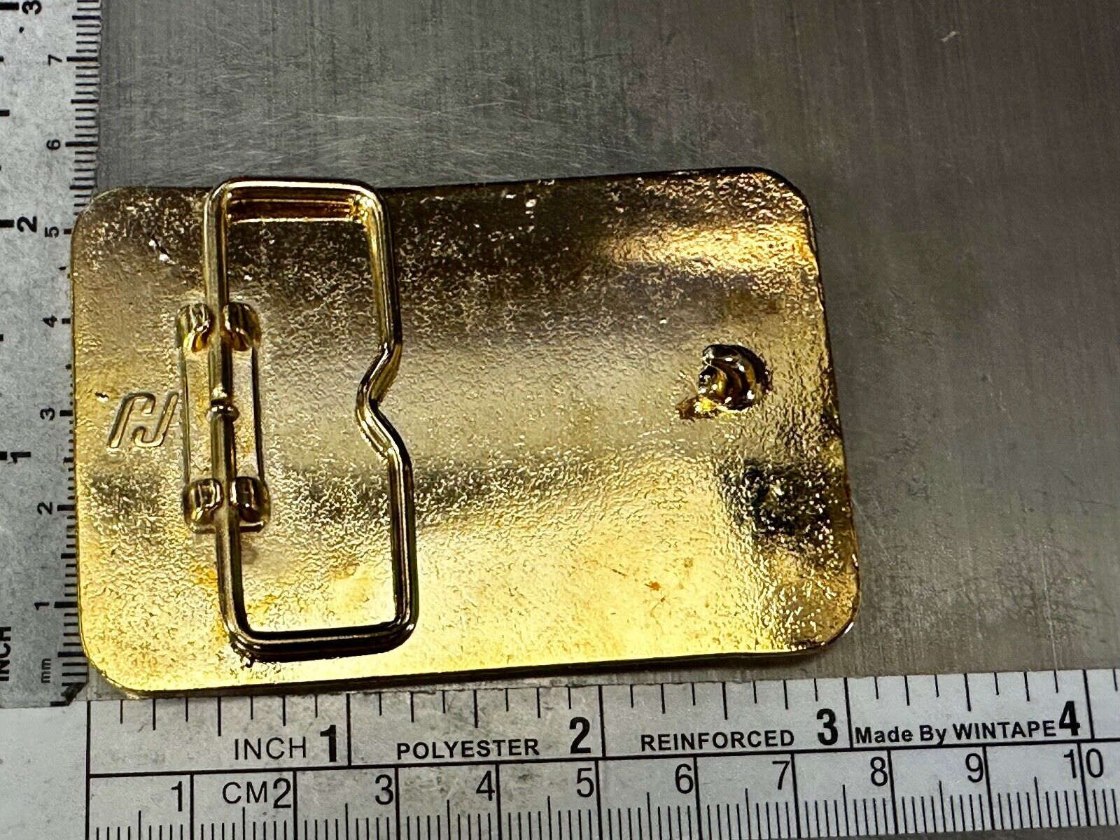 Austin Texas Distributing and Manufacturing 1987 Gold Tone Belt Buckle