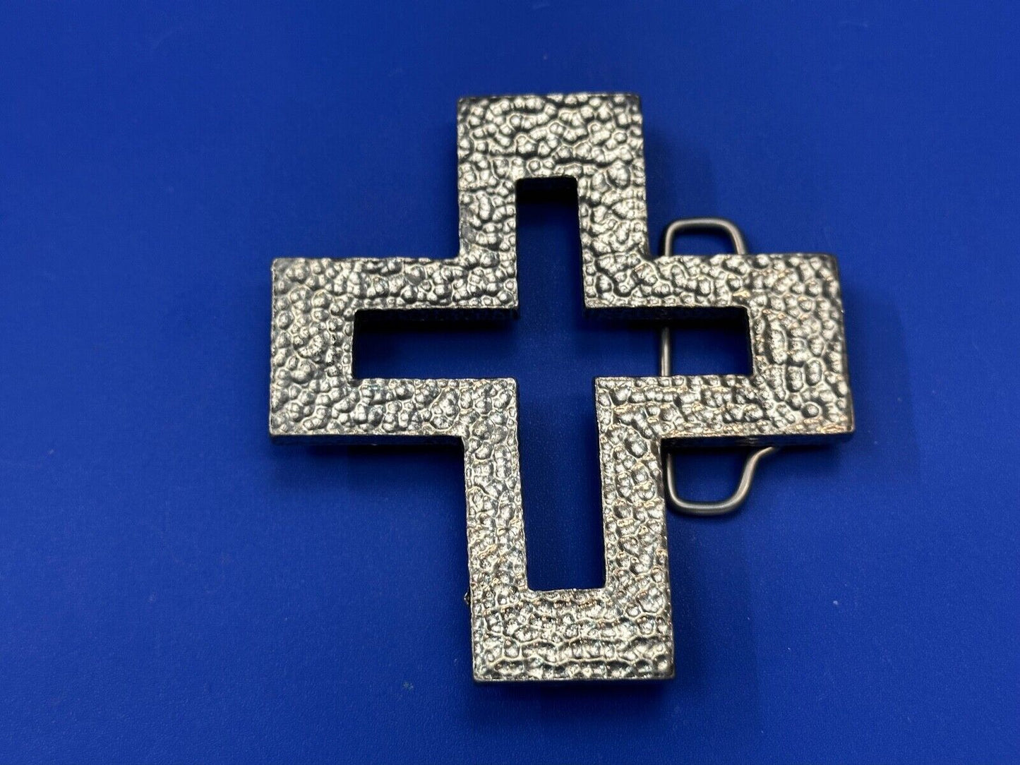 A.P.W. 2007 cross cutout silver tone belt buckle