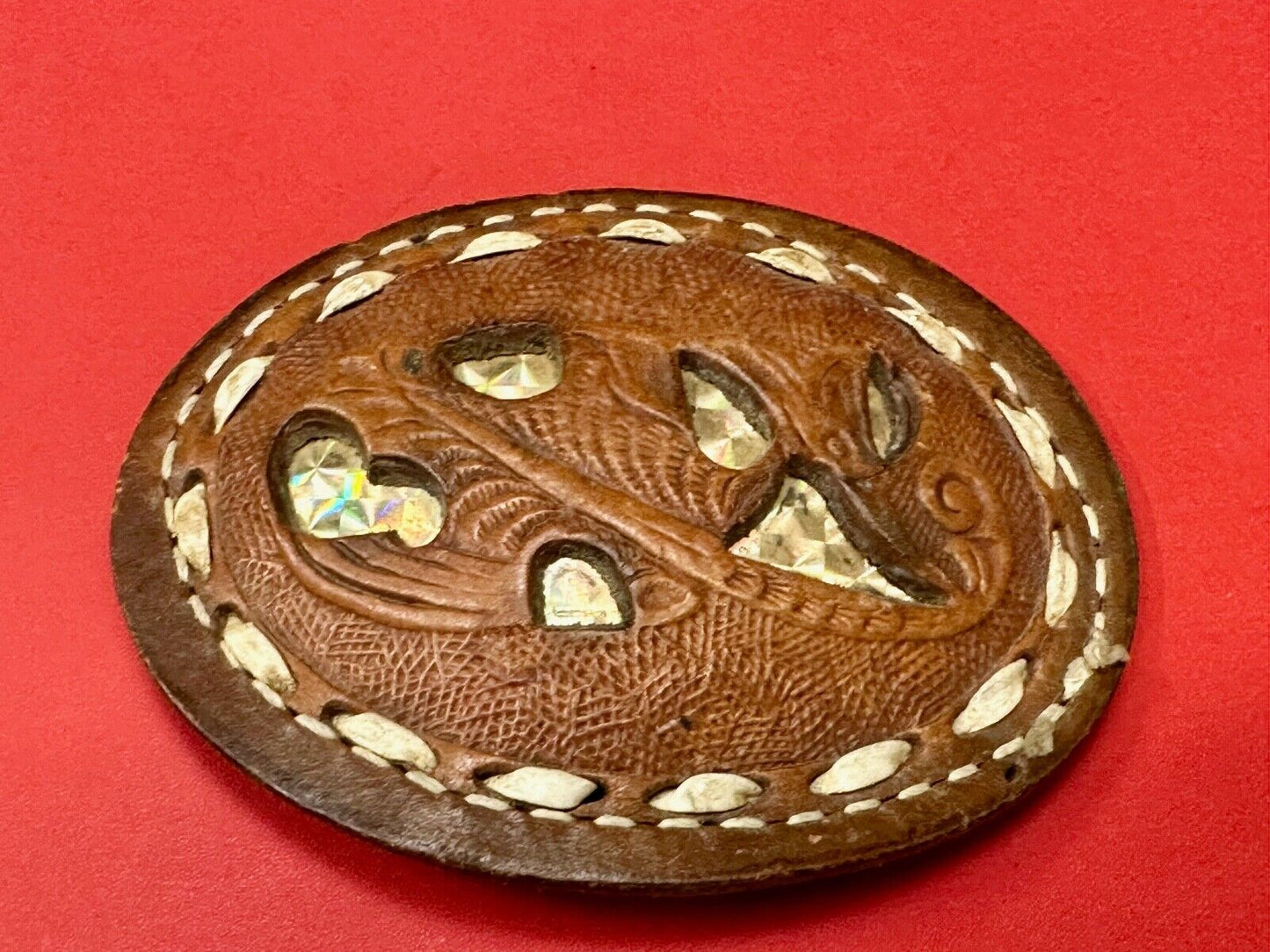 Unique leaf pattern in leather belt buckle made of Abalone shell