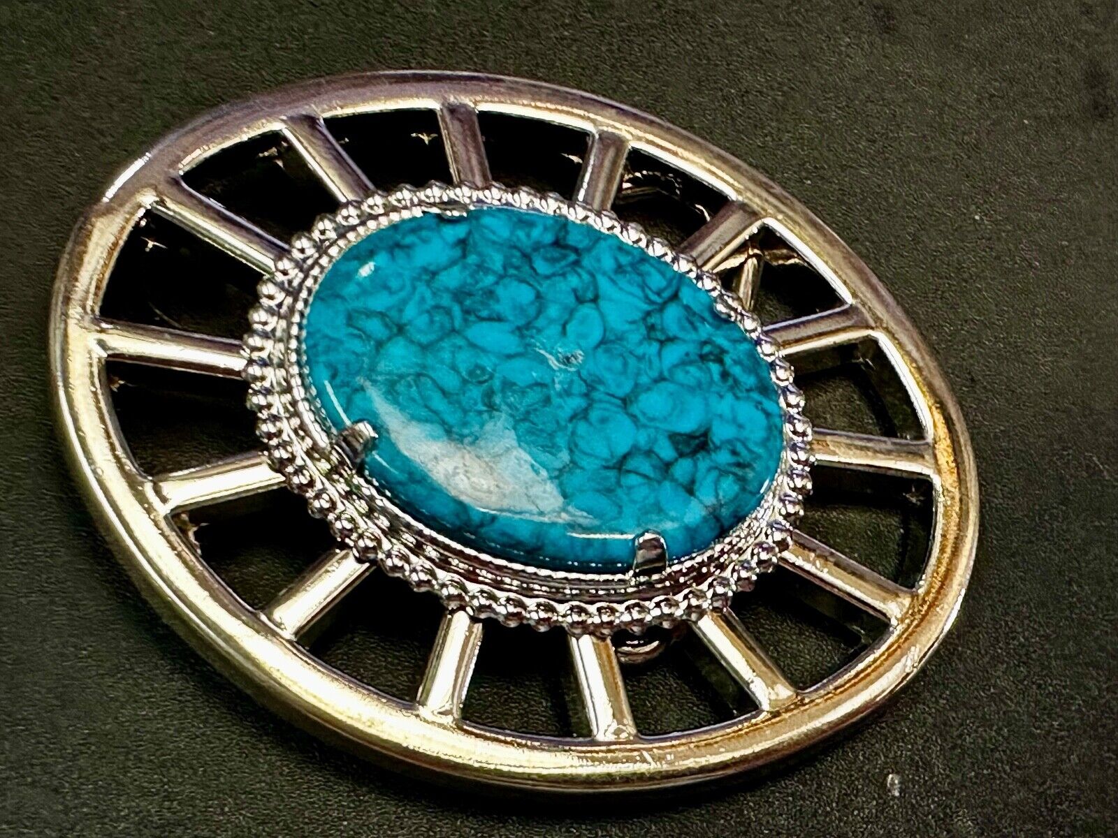 Synthetic Turquoise in unique see through silver tone round Belt Buckle