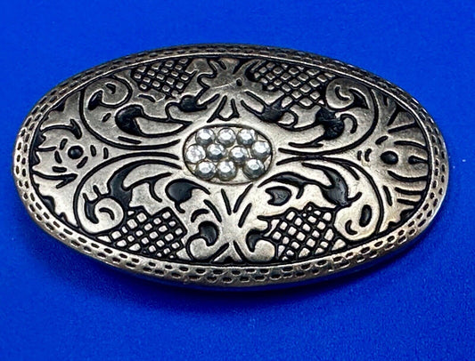 Vintage Cluster Centered in southwestern pattern oval belt buckle