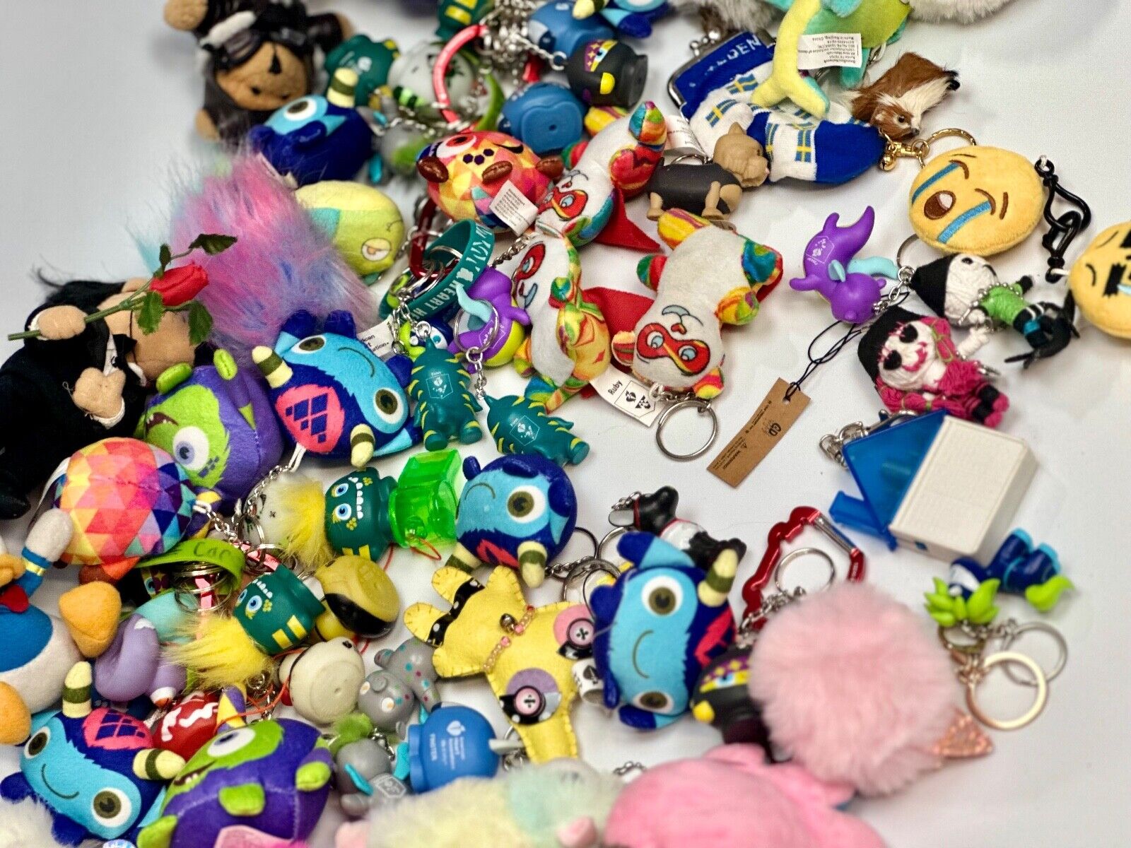 Around 75 plush doll Keychains Resale Bulk Lot, Junk Drawer Grab Bag