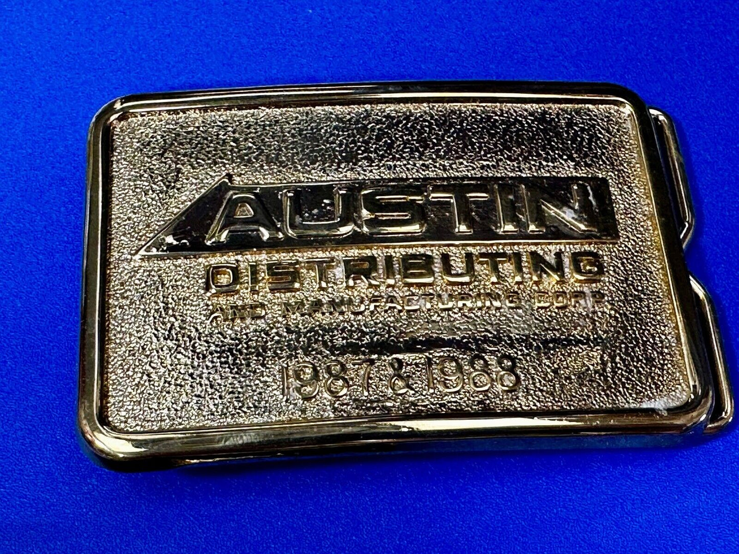 Austin Texas Distributing and Manufacturing 1987 - 1988 Gold Tone Belt Buckle