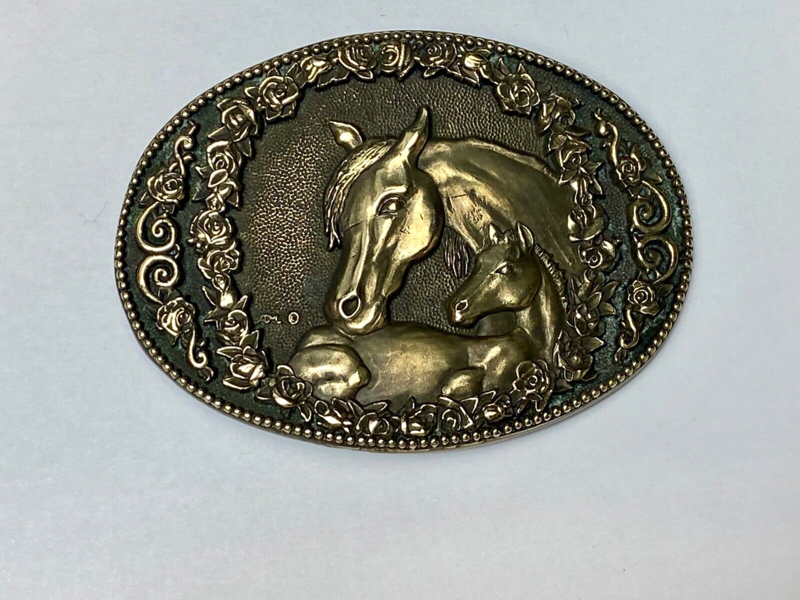 Two horse heads First addition brass belt buckle by Award Design Medals
