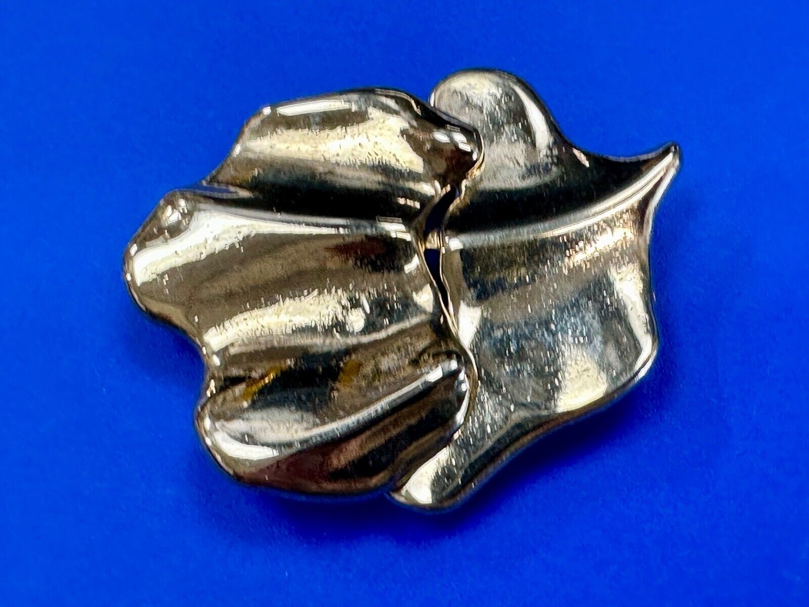 Two-piece interlocking gold tone leaf swirl theme belt slide buckle signed _____