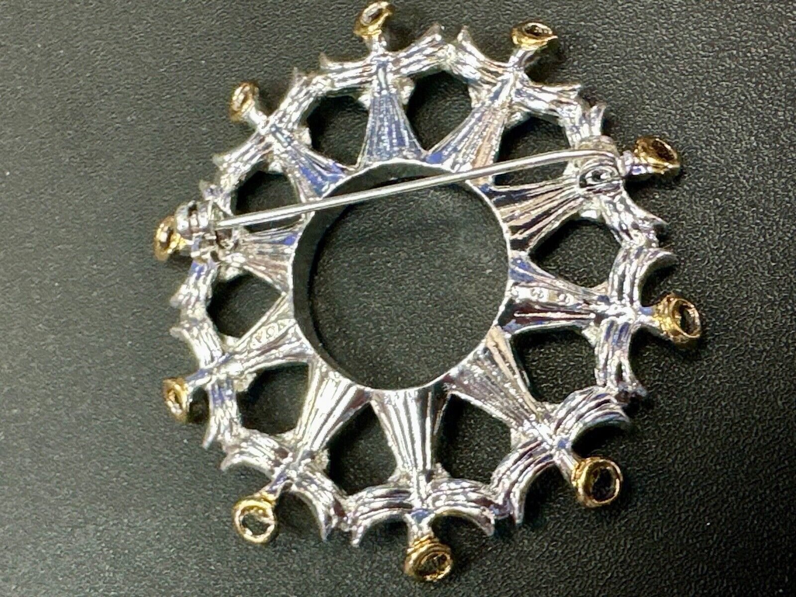 Angles in Circular pattern holiday wreath Avon signed vintage brooch pin