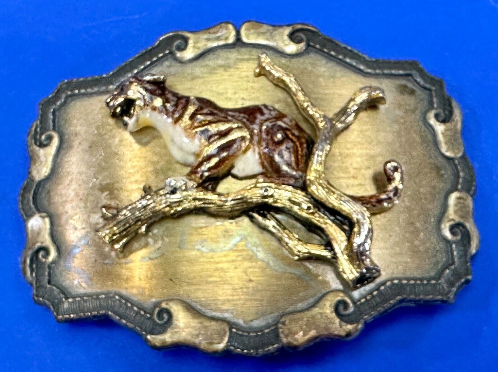 Vintage bobcat? leaping from branch western framed belt buckle by Raintree