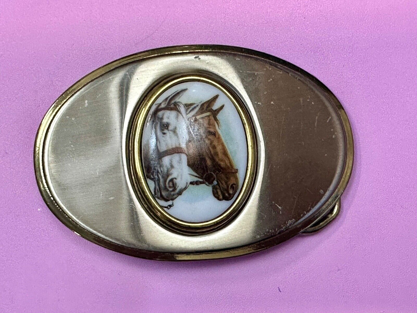 Two horse head picture in oval smooth gold tone Vintage Belt Buckle